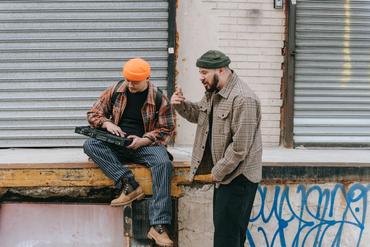 Spitting Rhymes for Flashy Grades: The Link Between Hip Hop Curriculum and Improved Learning