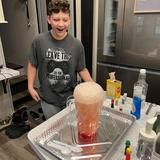 Georgia Cyber Academy (Virtual) Photo #2 - Students don't only learn on the computer. This student is conducting a science experiment in his kitchen using household supplies!
