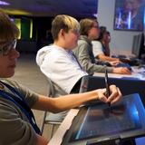 Desert Ridge Jr. High School Photo #3 - Our updated Multi-Media Center provides our students with amazing resources for digital art, design, and other online projects.